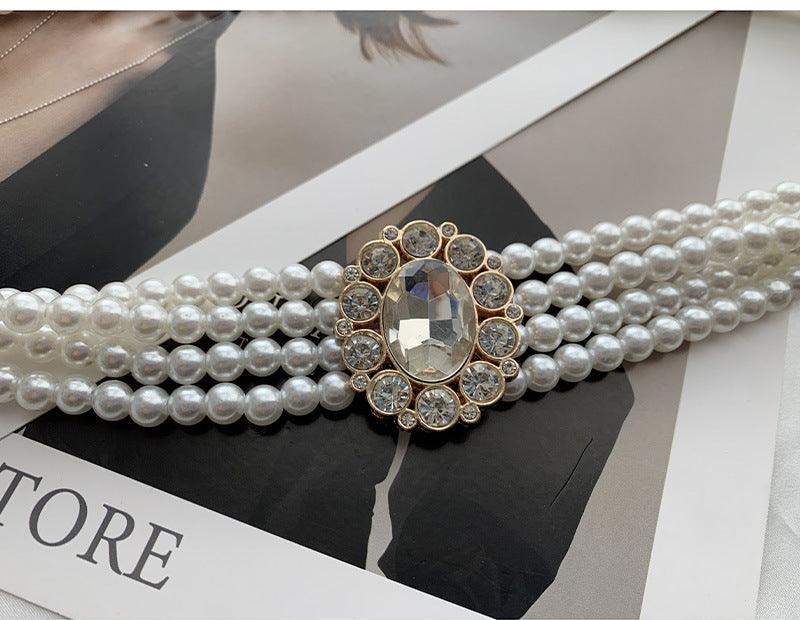 WG06 Pearl and diamond elastic belt with embellished buttons
