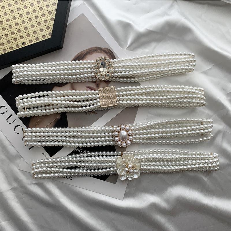 WG06 Pearl and diamond elastic belt with embellished buttons