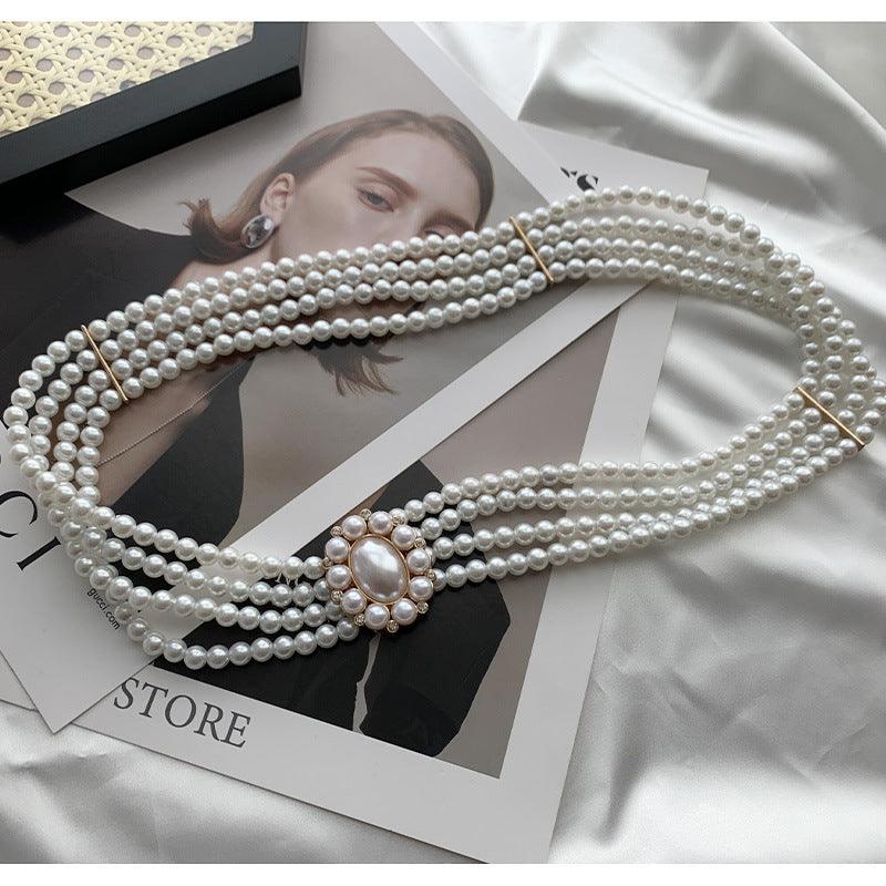 WG06 Pearl and diamond elastic belt with embellished buttons